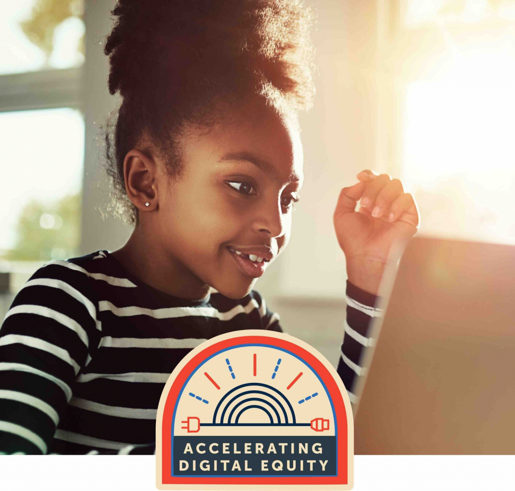 Girl working on laptop with Accelerating digital equity logo